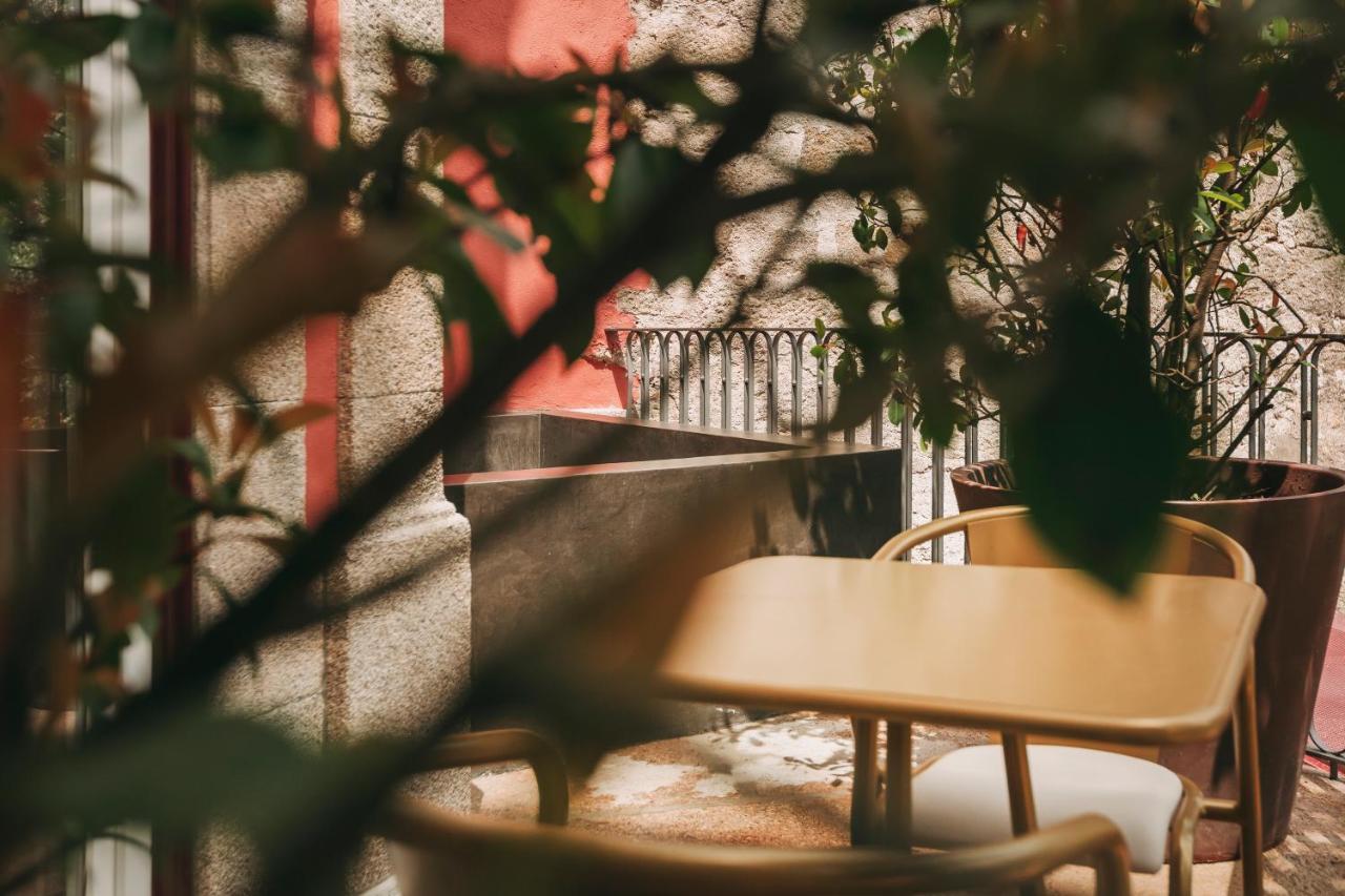 Torel Avantgarde Hotel Porto Exterior photo A table at a café in Athens, Greece